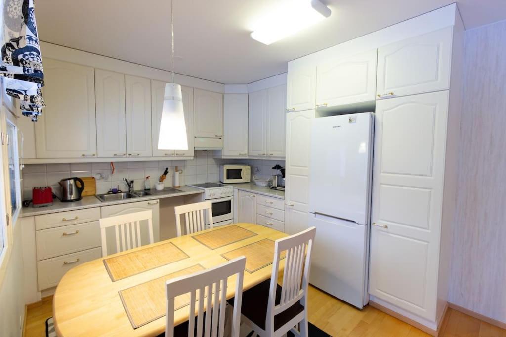 Apartment Rivitalokaksio *autokatospaikka*